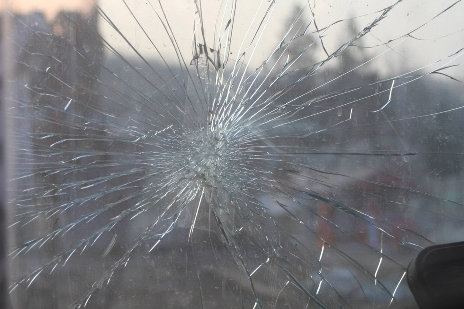 Impact crack spreading across a car windshield